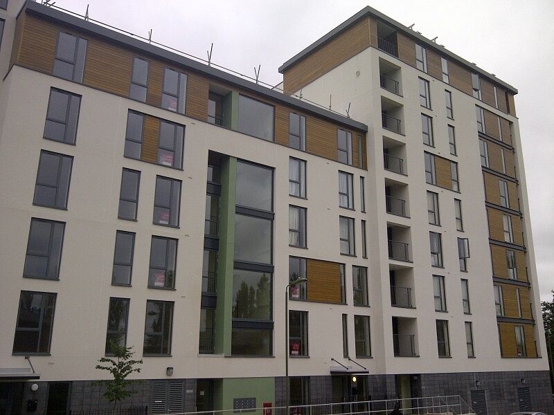 Pre-assembled timber cladding panels